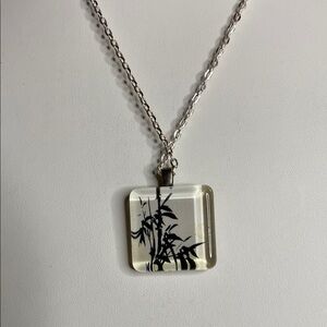 5 for $15 Silver white pendant with black accent